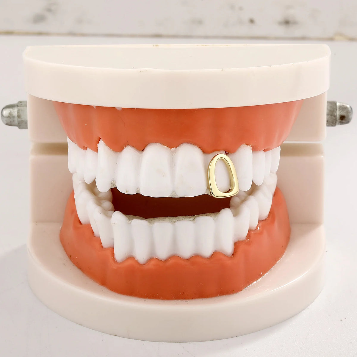 TOPGRILLZ Hip Hop Single Hollow Teeth Caps For Women Men Braces Simple Glossy Tooth Grills Jewelry Cosplay Dental Grillz